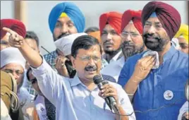  ?? HT FILE ?? Delhi CM and AAP national convener Arvind Kejriwal with party MLA Sukhpal Singh Khaira at a rally in n Gurdaspur district before last year’s assembly polls.