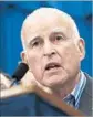  ?? Rich Pedroncell­i AP ?? GOV. JERRY BROWN has signed SB 54, which takes effect in January.