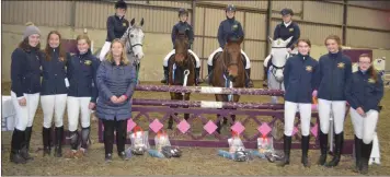  ??  ?? The Loreto open inter-schools team (from left): riders Méabh Byrne, Eimear Jackman, Ciara Banville and Alannah Lacey, supported by the rest of the Novice Loreto team girls and teacher Ms. Martin (chef d’equipe).