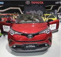  ?? MUHAMAD ALI/JAWA POS ?? BERGAYA: All New Toyota C-HR dipamerkan pula di IIMS 2018.