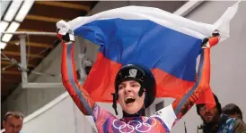  ?? FOTO: LEHTIKUVA/LIONEL BONAVENTUR­E ?? MISSTäNKT. Jelena Nikitina firade brons i OS i Sotji. Nu blir hon av med
medaljen.