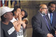  ?? HARRISON JONES/PITTSBURGH POST-GAZETTE/AP ?? Michelle Kenney, second from left, mother of Antwon Rose Jr., reacts as attorney Fred Rabner addresses reporters at the Allegheny County Courthouse in Pittsburgh on Wednesday.