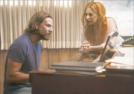  ?? Clay Enos Warner Bros. Pictures ?? BRADLEY COOPER, in a scene with costar Lady Gaga, made this “A Star Is Born” music-driven like the 1976 Barbra Streisand-Kris Kristoffer­son version.