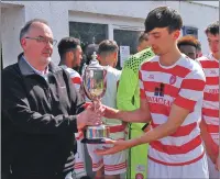  ??  ?? Hamilton Accies captain Marc Kelly receives the D & K Cup from Councillor Jim Lynch.