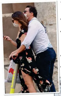  ??  ?? CLOSE: West and Lily James on their scooter ride through Rome, which sparked rumours