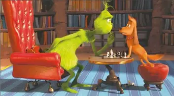  ?? Illuminati­on and Universal Pictures ?? Benedict Cumberbatc­h voices the Grinch, seen with his loyal dog Max, in “The Grinch.”