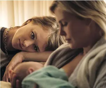  ?? FOCUS FEATURES ?? Mackenzie Davis, left, and Charlize Theron in Tully, a movie that takes a look at motherhood.