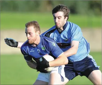  ??  ?? Ciaran Sheridan, right, in action during Glyde’s semi-final win over Roche Emmets.