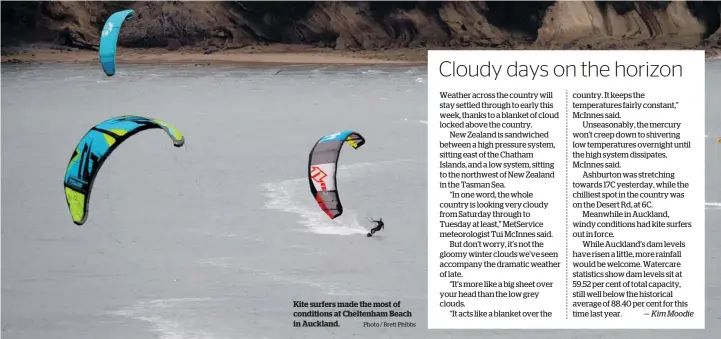  ?? Photo / Brett Phibbs ?? Kite surfers made the most of conditions at Cheltenham Beach in Auckland.