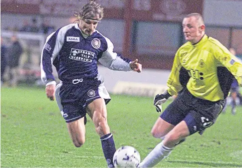  ??  ?? Claudio Caniggia takes on a certain Celtic goalkeeper during his spell with the Dark Blues.