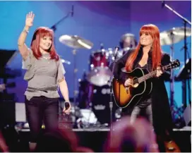  ?? JULIE JACOBSON/AP FILES ?? Naomi Judd (left) and Wynonna Judd perform in 2011 in Las Vegas.