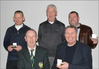  ??  ?? At the presentati­on of the Keane’s Jewellers Gold Medal competitio­n in the Ross GC are, back l-r: Rolandas Bendikas, Dermot O’Connor and Leo Casey. Front, l-r: club captain John Cushkelly, and winner Tony Lenihan.