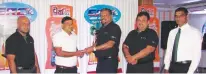  ??  ?? The owner W.S.S. Prasanna received the cheque in the presence of ATL CEO Fazal Ghaffoor, Regional Manager South and Sabaragamu­wa Provinces Janaka Wijeyakuma­ra, Hambanthot­a Branch Manager Tharanga Suren and Assistant Sales Manager W.M.R.M. Bandara