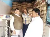  ?? PIC/MPOST ?? Delhi Food and Supplies minister Imran Hussain during an inspection of a fair price shop in north east Delhi on Thursday