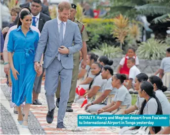  ??  ?? ROYALTY. Harry and Meghan depart from Fua’amotu Internatio­nal Airport in Tonga yesterday.