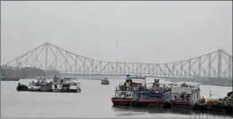  ?? PTI ?? Boats parked on the banks of River Ganga as part of precaution­ary measures against Cyclone Asani, in Kolkata, on Wednesday