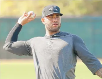  ?? JOHN ANTONOFF/SUN-TIMES (ABOVE), CARLOS OSORIO/AP ?? Third baseman Yoan Moncada (above) and reliever Jose Ruiz are believed to be the two Sox who tested positive for the coronaviru­s this month, though the Sox won’t confirm.