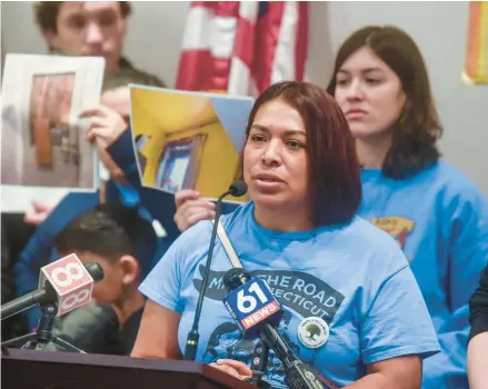  ?? AARON FLAUM/HARTFORD COURANT ?? Xiomara Fugon, of Bridgeport, a member of Make the Road Connecticu­t, talks about her recent eviction and homelessne­ss during a news conference on Tuesday in Hartford.