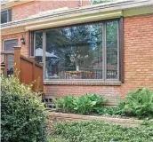  ?? James Dulley photos ?? When the rolling shutter is open, the small housing under the soffit is barely noticeable