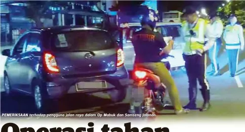  ??  ?? PEMERIKSAA­N terhadap pengguna jalan raya dalam Op Mabuk dan Samseng Jalanan.