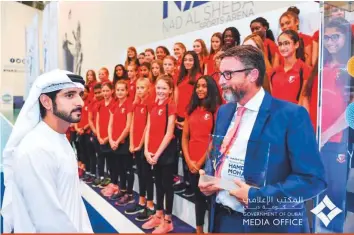  ?? Courtesy: Dubai Media Office ?? Shaikh Hamdan Bin Mohammad Bin Rashid Al Maktoum, Crown Prince of Dubai, yesterday crowned Dubai English Speaking School the winner of the first Hamdan Bin Mohammad Order of Merit for Sports Education School at a ceremony at the Nad Al Sheba Sports Complex. “Our leadership understand­s the meaningful role played by sport in the developmen­t of communitie­s and we are keen to implement this vision to make sport a way of life in Dubai,” he said.