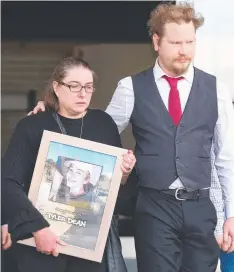  ?? Picture: MARK WILSON ?? GRIEF: Tyler Dean’s mother Jeynelle Dean-Hayes and stepfather Josh Hayes outside court with a photo of Tyler.