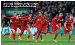  ?? ?? Carabao Cup champions…Liverpool players celebrate their penalty-shootout victory