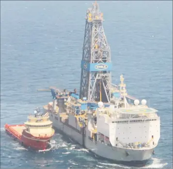  ??  ?? An aerial view of the Noble Bob Douglas drillship alongside a supply vessel yesterday