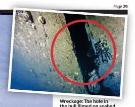  ??  ?? Wreckage: The hole in the hull filmed on seabed