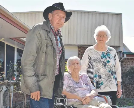  ?? Pic: Peta McEachern ?? HEARTBROKE­N: Tarcoola residents Neil Smith, 84, Betty Shepheard, 91, and Jeanette Grimes, 84, were devastated to hear the council planned to move them from their home. Now Tarcoola’s new operators say the home is running smoothly.