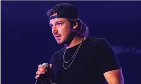  ?? ?? Morgan Wallen performs onstage in 2022. Photograph: Jeff Kravitz/Getty Images for iHeartRadi­o