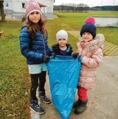  ?? Foto: Brachwitz ?? Amaya (8 Jahre alt), Felix (3) und Amalia (6) sammeln fleißig Müll.