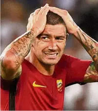  ?? — AFP ?? Unlikely hero: Defender Aleksandar Kolarov scored the winner in AS Roma’s victory over Torino.