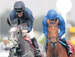  ?? Picture: PA. ?? Impressive performanc­e: Ryan Moore rides Winter to victory in the Qatar Nassau Stakes.