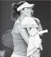  ?? Vincent Thian Associated Press ?? GARBINE MUGURUZA lost her third- round Australian Open match to Barbora Strycova, 3- 6, 2- 6.