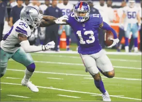  ?? Michael Ainsworth / Associated Press ?? New York Giants wide receiver Odell Beckham runs past Dallas Cowboys cornerback Anthony Brown on Sept. 16.