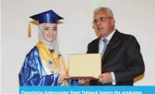  ??  ?? Palestinia­n Ambassador Rami Tahboub honors the graduates.