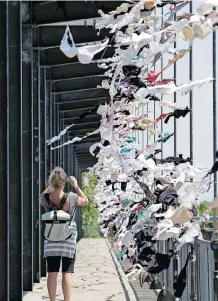  ?? ?? THOUSANDS of bras hang in the Old Port of Montreal, Canada, during a fundraisin­g campaign for the Quebec Breast Cancer Society in 2008. | CHRISTINNE MUSCHI Reuters