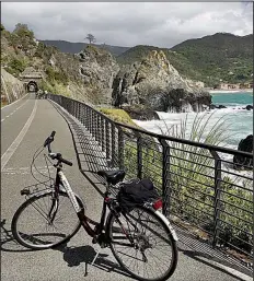  ?? Rick Steves’ Europe/CAMERON HEWITT ?? A bike ride between Levanto and the sleepy village of Bonassola offers up views of the Italian Riviera’s stunning coastline.