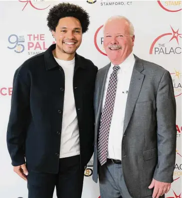  ?? Wah from HAPPYHAHA Studio/Contribute­d photo ?? Emmy Award-winning comedian Trevor Noah and Michael E. Moran Jr., president and CEO of The Palace Theatre, at the nonprofit’s 11th annual Gala.