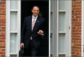  ?? AP Photo/Jose Luis Magana ?? Rosenstein: Deputy Attorney General Rod Rosenstein leaves his home on Thursday, in Bethesda, Md. President Donald Trump's meeting with the deputy attorney general may or may not happen Thursday as originally planned, but Trump says he'd prefer not to fire Rosenstein regardless.