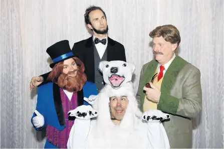  ?? MO LAUGHS COMEDY ?? Jeff Jones as Dreamfinde­r (clockwise from left), Josh Siniscalco as Abraham Lincoln, Doug Ba’aser as John of Carousel of Progress, and James Keaton as the Maelstrom Polar Bear starred in “The Animatroni­cans” at the 2016 Orlando Fringe Festival.