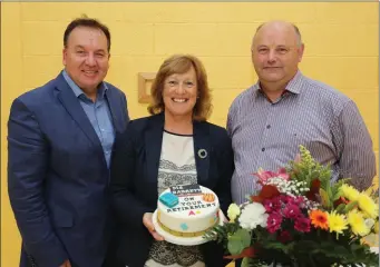  ??  ?? Sue Barrett, who has retired as principal of Kennedy College, is pictured with husband John Barrett (left) and Dominic Hearne, vice principal Kennedy College.