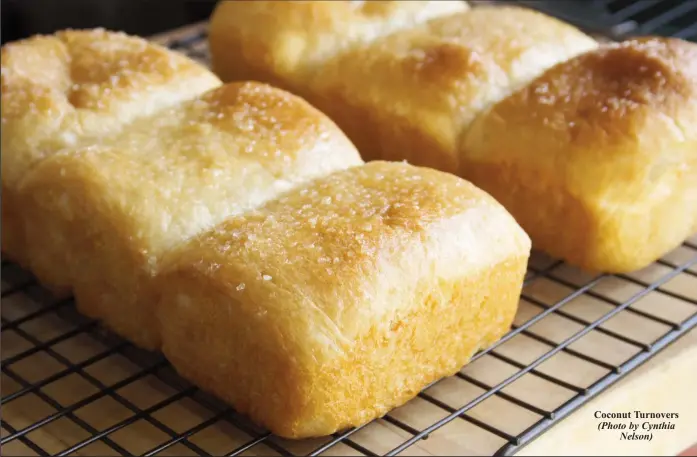  ?? (Photo by Cynthia Nelson) ?? Coconut Turnovers