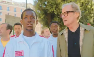  ?? NETFLIX ?? Micheal Ward, left, and Bill Nighy star in the sports drama “The Beautiful Game.”