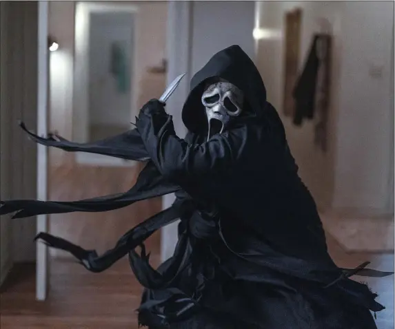  ?? PHILIPPE BOSSÉ — PARAMOUNT PICTURES VIA AP ?? Ghostface is back, again, in “Scream VI.”