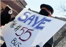  ?? JiM MicHaud / Boston Herald ?? SAVE THE 55! Local resident Charles Martel protests with other area residents, joined by some elected officials objecting to the suspension of #55 bus route at the corner of Jersey Street and Queensbury Street in the Fenway section of the city on Sunday.