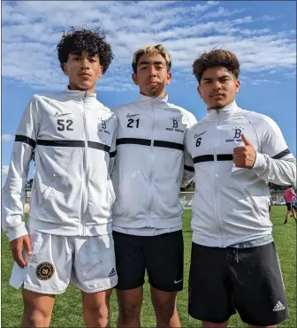  ?? PHOTO BY HALEY SAWYER ?? Birmingham Charter boys soccer players, from left, Steven Ramos, Oscar Vargas and Diego Ceja are attempting to lead the Patriots to a Los Angeles City Section championsh­ip.