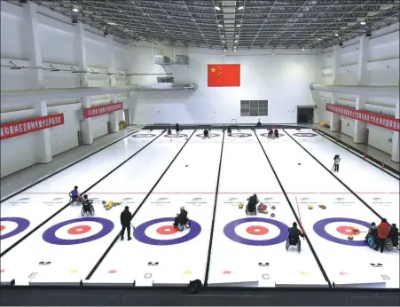  ?? XINHUA ?? China’s wheelchair curlers are preparing for the 2022 Winter Paralympic­s at a custom-built venue in Beijing’s Yanqing district.