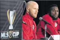  ?? CP PHOTO ?? Toronto FC forward Jozy Altidore, right, listens as captain Michael Bradley answers a question during their news conference in Toronto on Thursday.